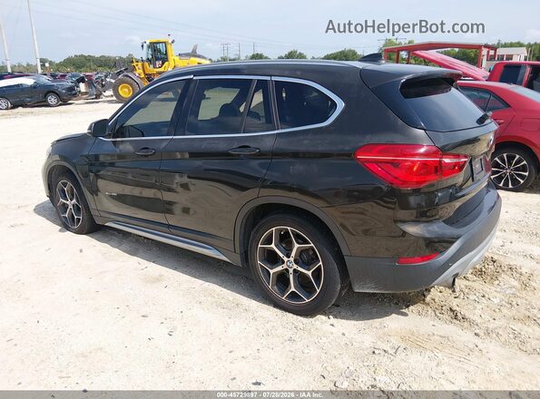 WBXHT3C31G5E55430 2016 BMW X1 Black სალონის 360-გრადუსიანი ხედი
