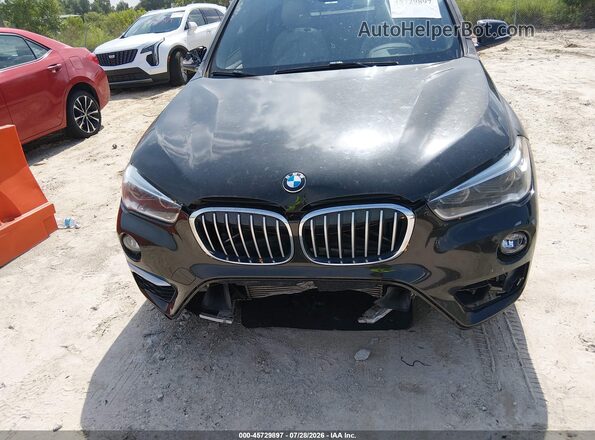WBXHT3C31G5E55430 2016 BMW X1 Black ხელსაწყოთა პანელის ხედი