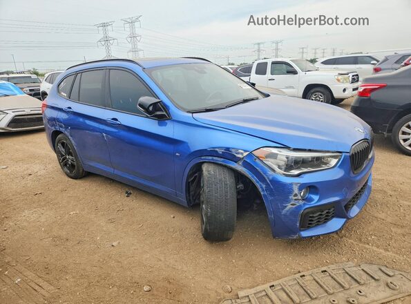 WBXHT3C31G5E56349 2016 BMW X1 Blue Delantero derecho