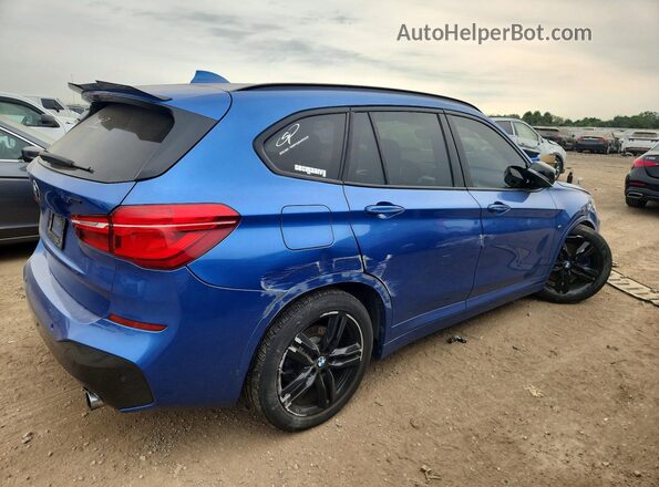 WBXHT3C31G5E56349 2016 BMW X1 Blue Trasero derecho