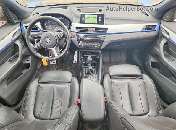 WBXHT3C31G5E56349 2016 BMW X1 Blue Vista del salpicadero