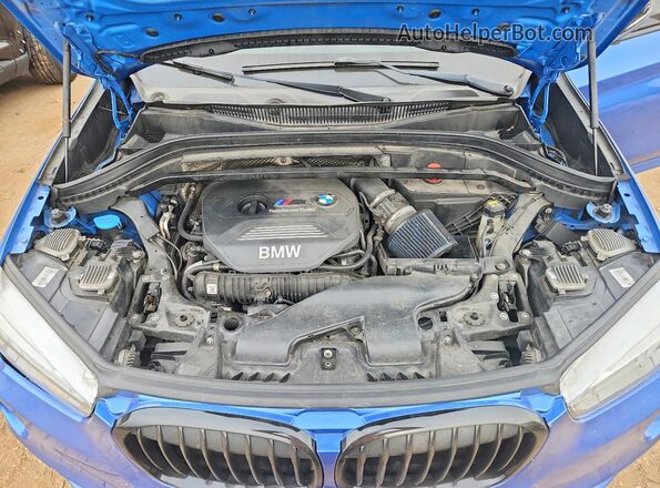 WBXHT3C31G5E56349 2016 BMW X1 Blue Vista interior trasera