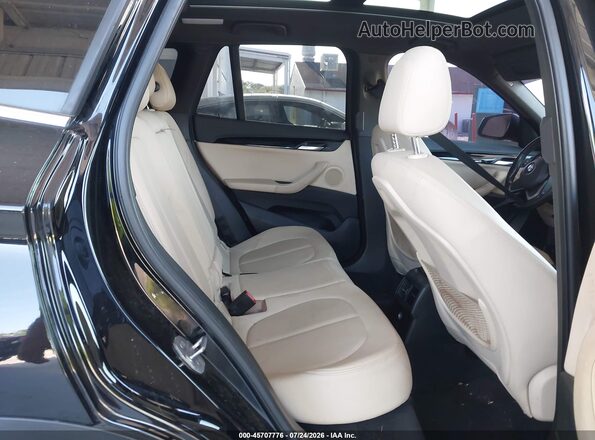 WBXHT3C31G5F64289 2016 BMW X1 Black VIN կոդի պիտակի տեսք
