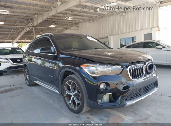 WBXHT3C31G5F64289 2016 BMW X1 Black Դիմացի տեսք