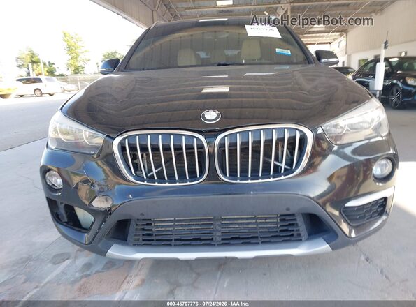 WBXHT3C31G5F64289 2016 BMW X1 Black Սարքավորումների վահանակի տեսք