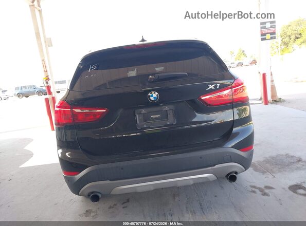 WBXHT3C31G5F64289 2016 BMW X1 Black 