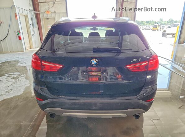 WBXHT3C31GP884701 2016 BMW X1 Black Հետևի տեսք