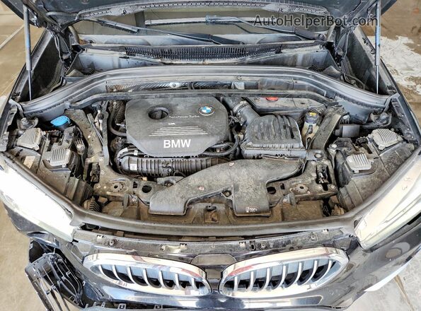 WBXHT3C31GP884701 2016 BMW X1 Black Սալոնի հետևի տեսք