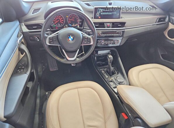 WBXHT3C31GP884701 2016 BMW X1 Black Առջևի վահանակի տեսք