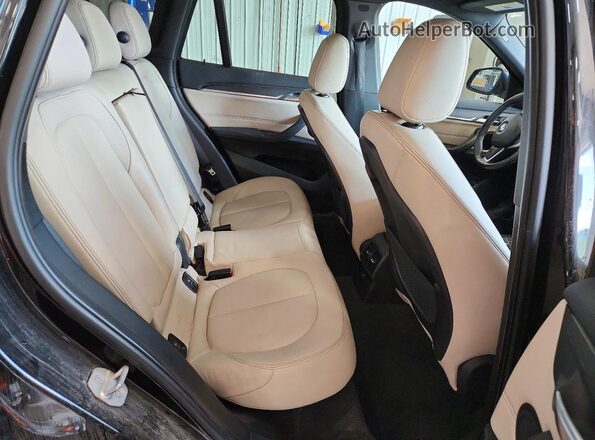 WBXHT3C31GP884701 2016 BMW X1 Black Հետևի նստատեղերի տեսք