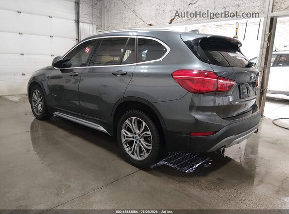 WBXHT3C31H5F74063 2017 BMW X1 Black Trasero izquierdo