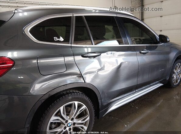 WBXHT3C31H5F74063 2017 BMW X1 Black Vista frontal