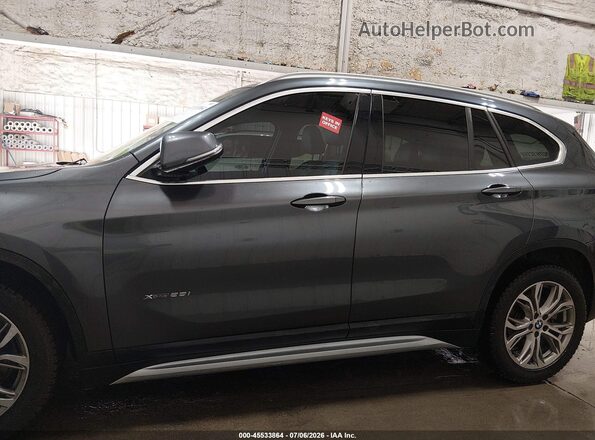 WBXHT3C31H5F74063 2017 BMW X1 Black Vista interior de 360 grados