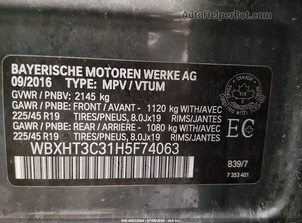 WBXHT3C31H5F74063 2017 BMW X1 Black Vista del compartimento del motor
