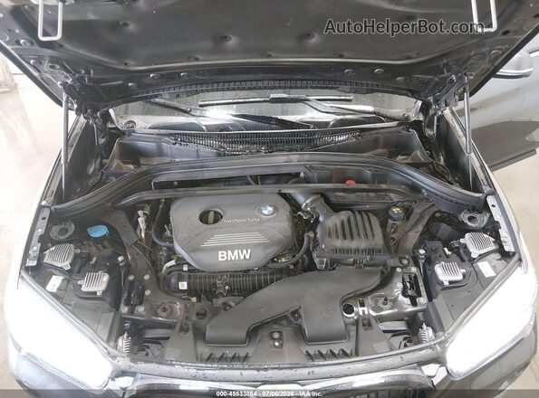 WBXHT3C31H5F74063 2017 BMW X1 Black Vista trasera