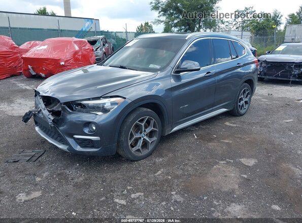 WBXHT3C31H5F78517 2017 BMW X1 Gray წინა მარცხენა ხედი სამი მეოთხედიდან