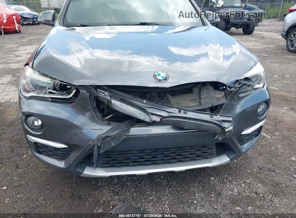 WBXHT3C31H5F78517 2017 BMW X1 Gray წინა ხედი