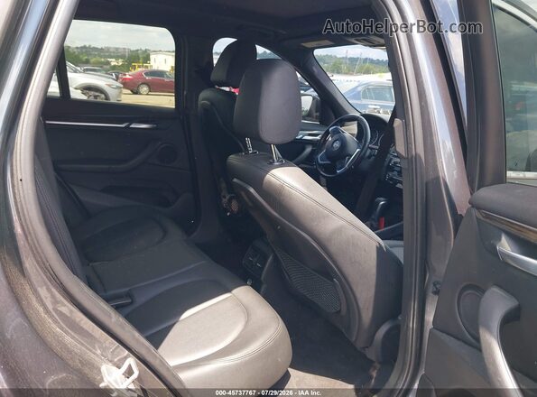 WBXHT3C31H5F78517 2017 BMW X1 Gray VIN კოდის სტიკერის ხედი