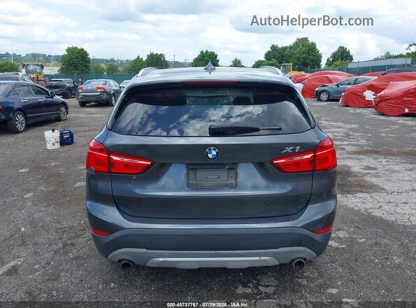 WBXHT3C31H5F78517 2017 BMW X1 Gray 