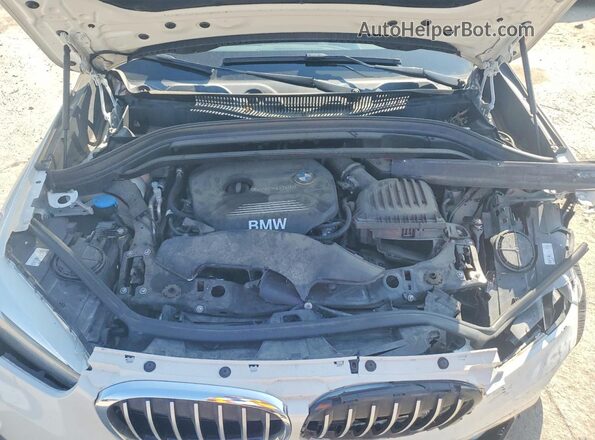 WBXHT3C31J5K21440 2018 BMW X1 White Вид задньої частини салону