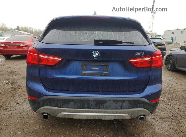 WBXHT3C31J5K29781 2018 BMW X1 Blue Vista trasera