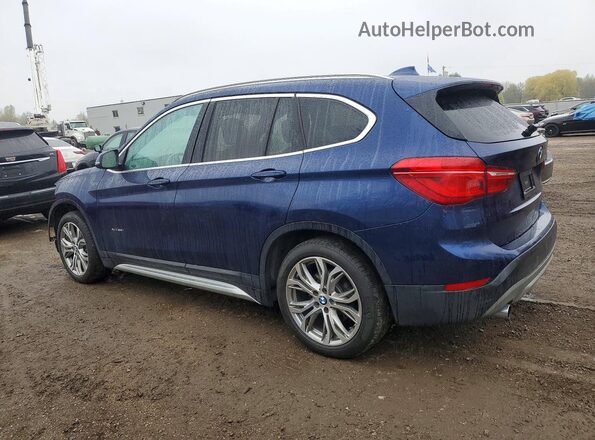 WBXHT3C31J5K29781 2018 BMW X1 Blue Trasero izquierdo