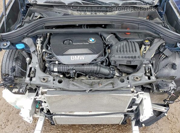 WBXHT3C31J5K29781 2018 BMW X1 Blue Vista interior trasera