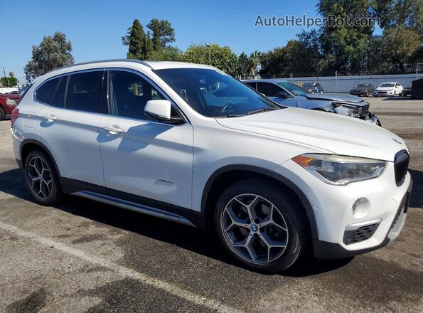 WBXHT3C32GP882441 2016 BMW X1 Белый Передняя правая четверть