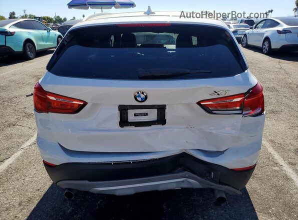 WBXHT3C32GP882441 2016 BMW X1 Белый Вид сзади