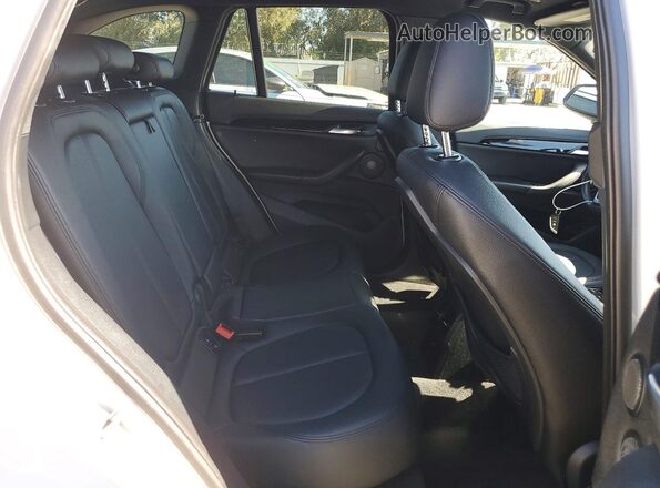 WBXHT3C32GP882441 2016 BMW X1 Белый Вид задней части салона