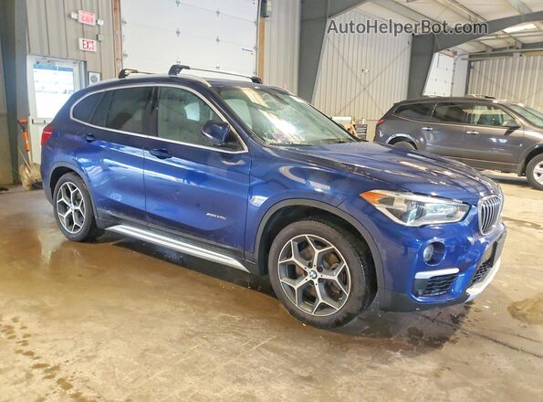 WBXHT3C32GP883105 2016 BMW X1 Blue Delantero derecho
