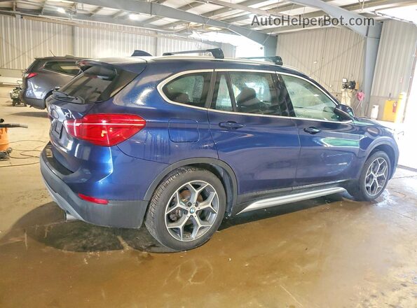 WBXHT3C32GP883105 2016 BMW X1 Blue Trasero derecho