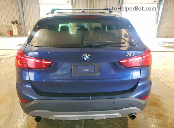 WBXHT3C32GP883105 2016 BMW X1 Blue Vista trasera