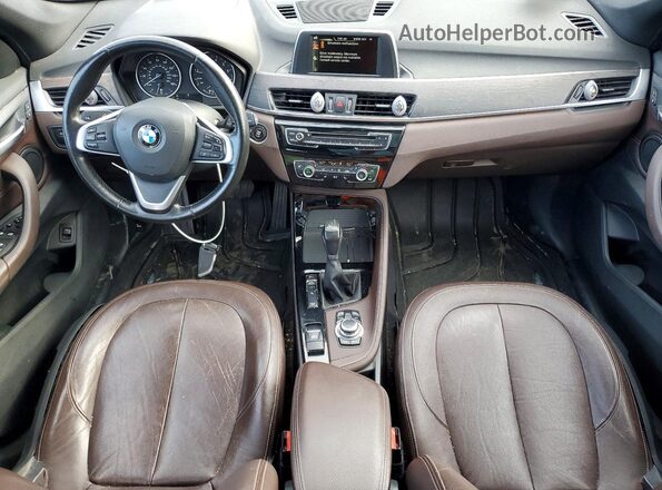 WBXHT3C32GP883105 2016 BMW X1 Blue Vista del salpicadero