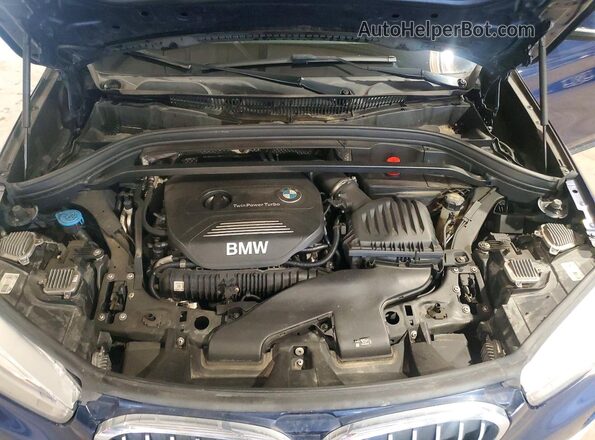 WBXHT3C32GP883105 2016 BMW X1 Blue Vista del compartimento del motor