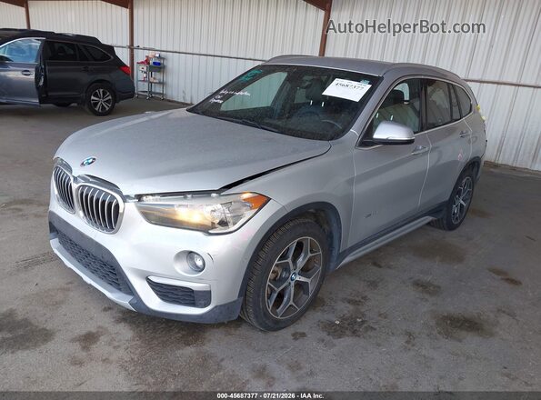 WBXHT3C32H5F68434 2017 BMW X1 Silver Front left