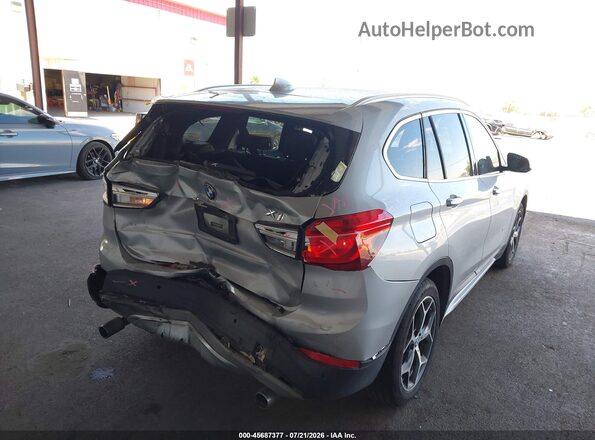 WBXHT3C32H5F68434 2017 BMW X1 Silver Rear right