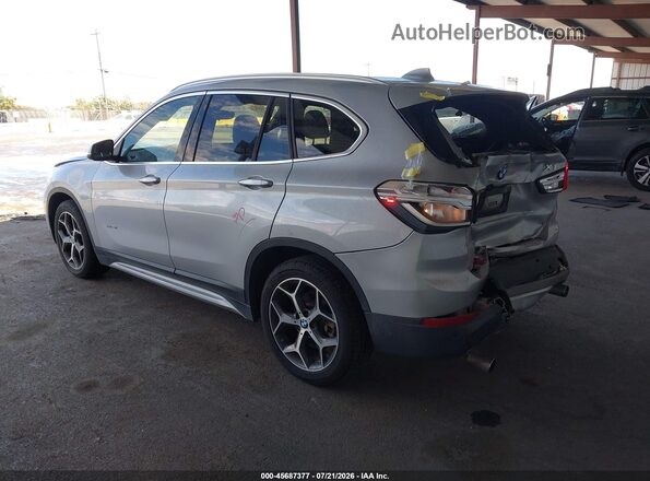 WBXHT3C32H5F68434 2017 BMW X1 Silver Rear left