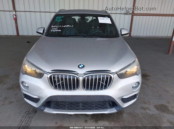 WBXHT3C32H5F68434 2017 BMW X1 Silver Instrument cluster view