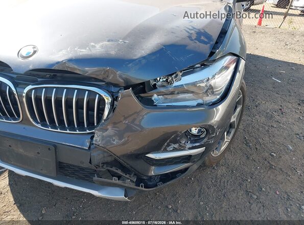 WBXHT3C32H5F80065 2017 BMW X1 Gray წინა ხედი