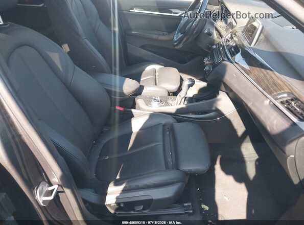WBXHT3C32H5F80065 2017 BMW X1 Gray წინა სალონის ხედი