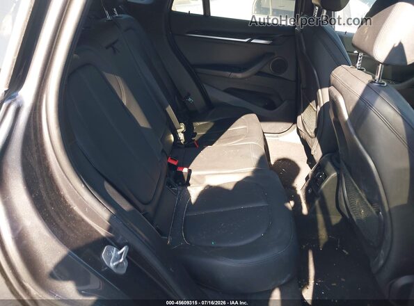 WBXHT3C32H5F80065 2017 BMW X1 Gray VIN კოდის სტიკერის ხედი