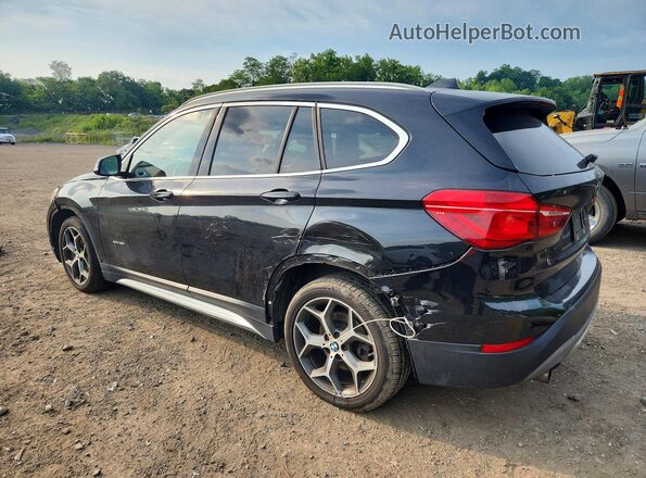 WBXHT3C32J5F90813 2018 BMW X1 Black Tył lewy