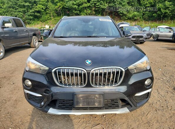 WBXHT3C32J5F90813 2018 BMW X1 Black Widok z przodu