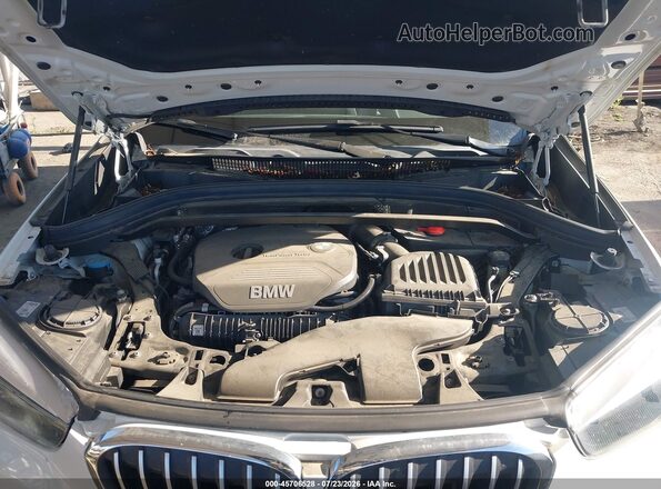 WBXHT3C33G5E49967 2016 BMW X1 White Հետևի տեսք