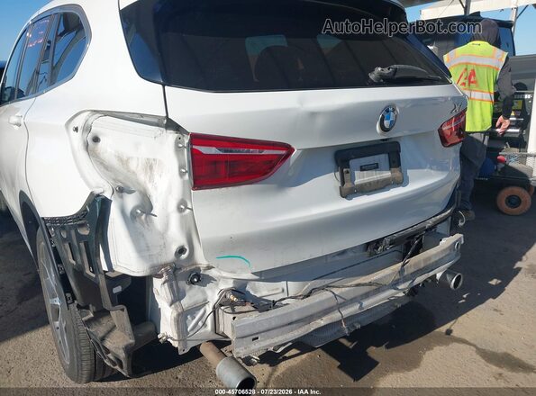 WBXHT3C33G5E49967 2016 BMW X1 White Դիմացի տեսք