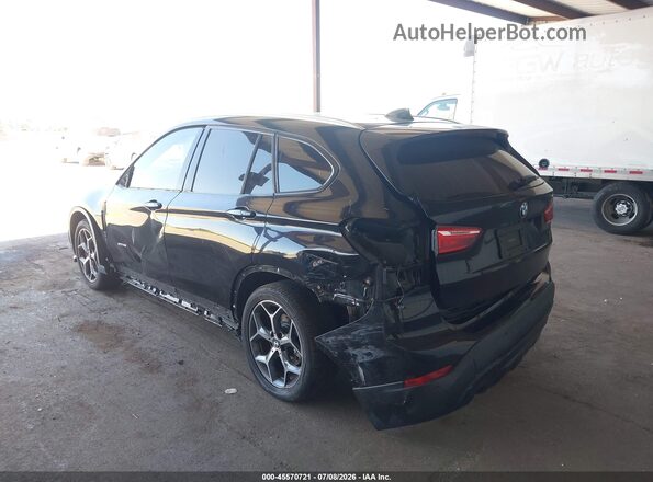 WBXHT3C33G5E50164 2016 BMW X1 Black წინა ხედი