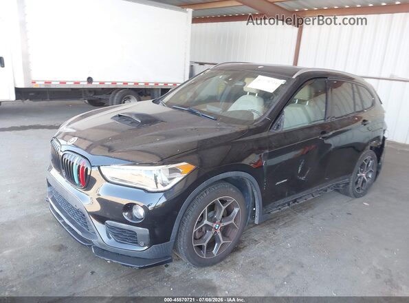 WBXHT3C33G5E50164 2016 BMW X1 Black წინა მარცხენა ხედი სამი მეოთხედიდან