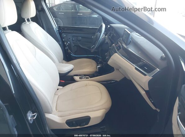 WBXHT3C33G5E50164 2016 BMW X1 Black წინა სალონის ხედი