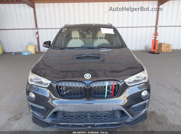 WBXHT3C33G5E50164 2016 BMW X1 Black უკანა სალონის ხედი